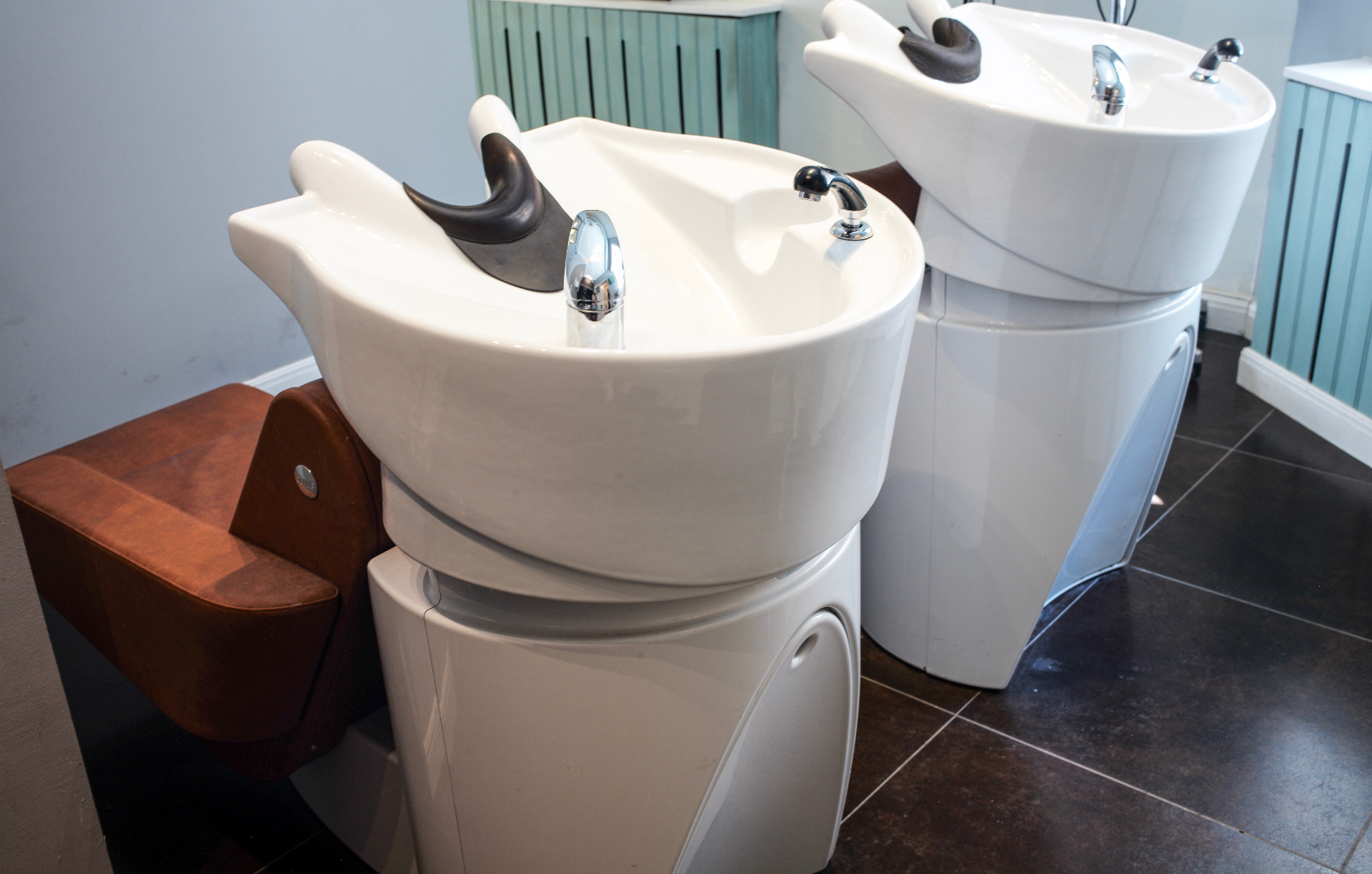 Double backwash area with leather chairs