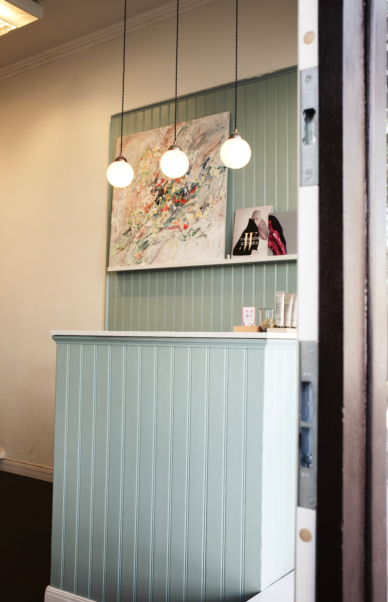 Reception counter with globe pendants